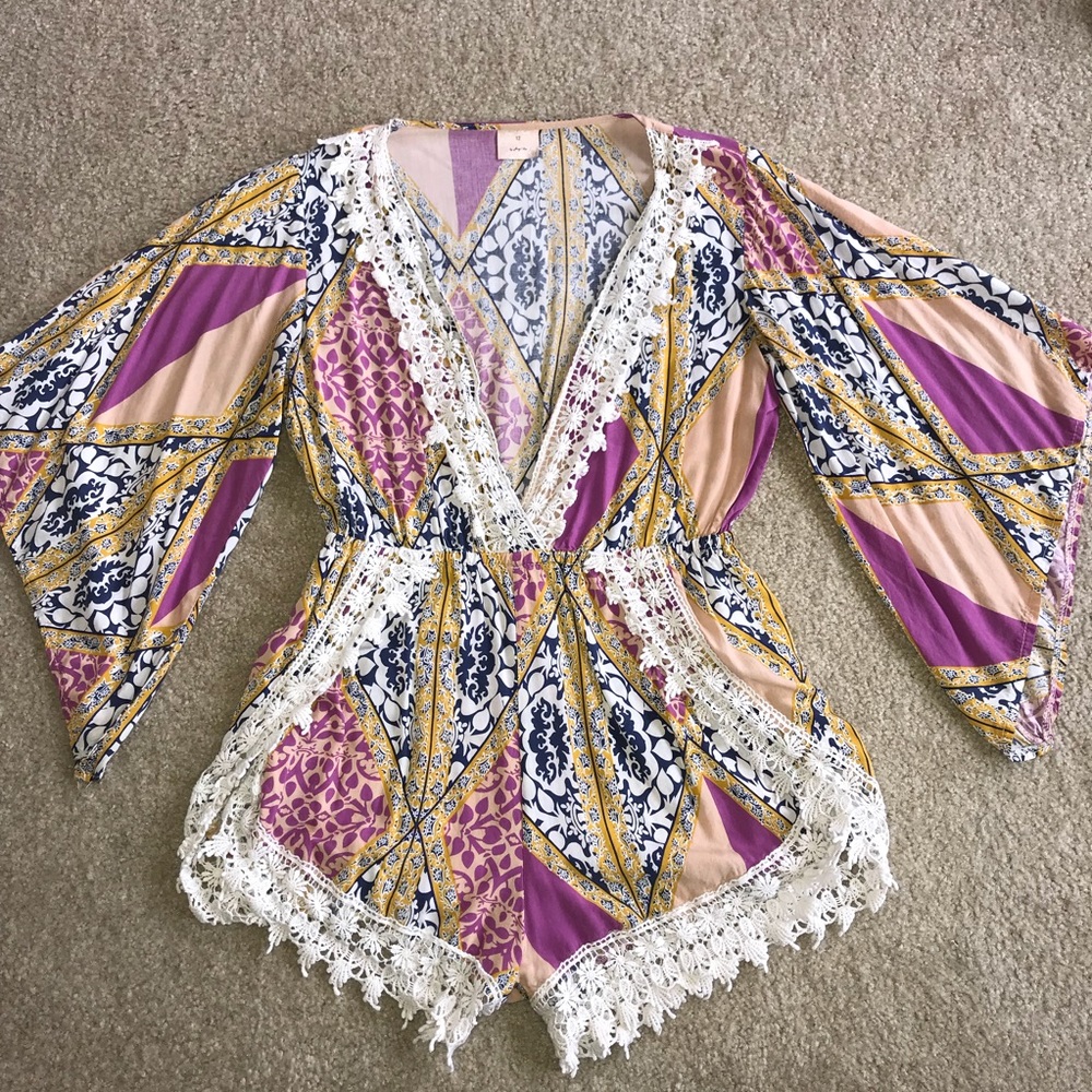 Mura Boutique deep v romper
